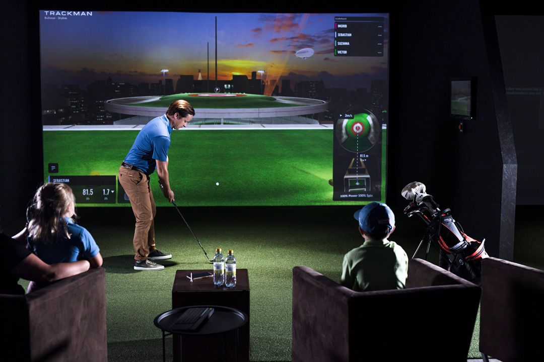 Trackman Indoor family playing bullseye.jpg